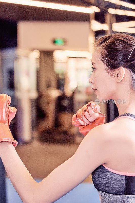 Fitness girl working out in a gym